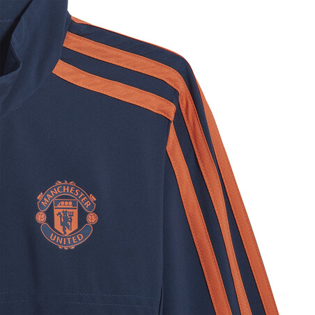 Ensemble survêtement enfant Manchester United bleu orange 2022/23