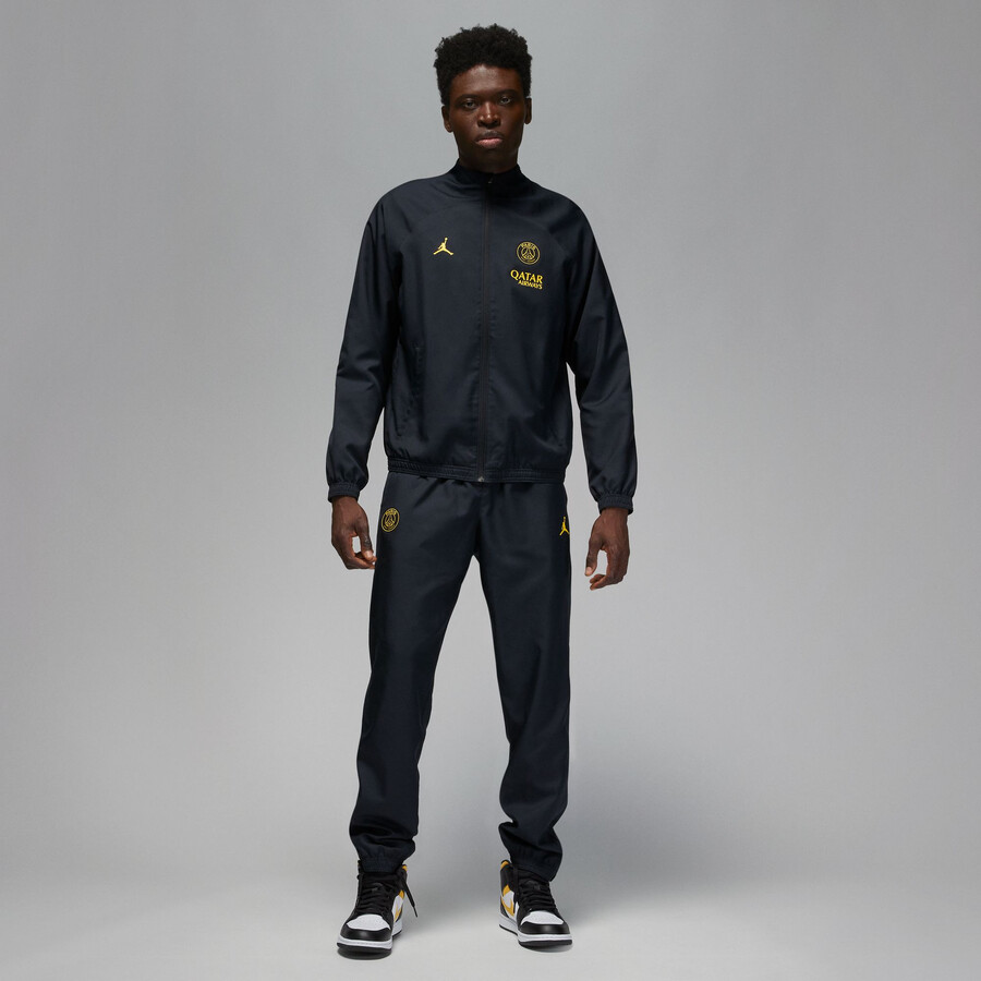 Ensemble survetement PSG Woven noir jaune 2022 23 sur Foot