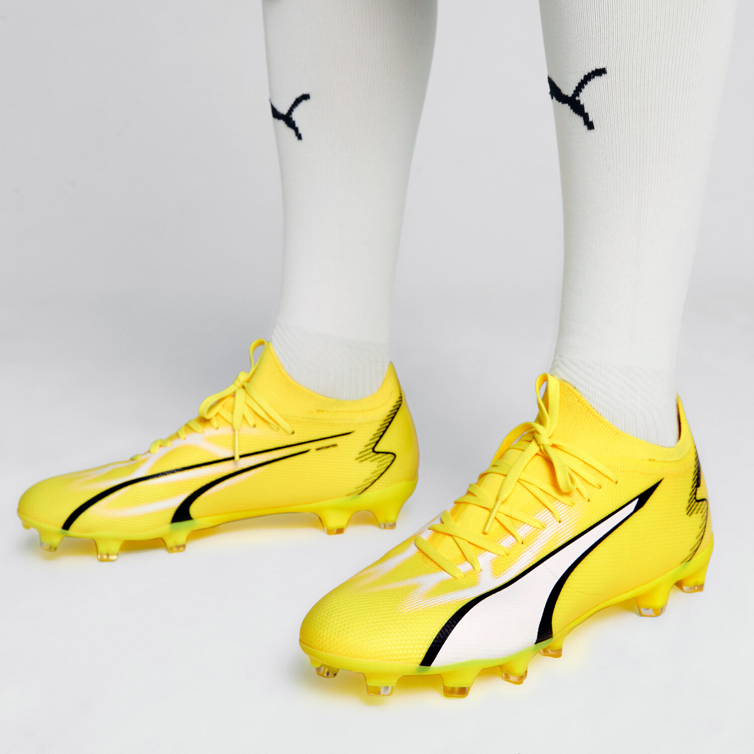 Puma match best sale homme jaune