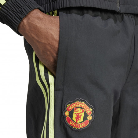 Pantalon survêtement Manchester United Woven noir jaune 2023/24
