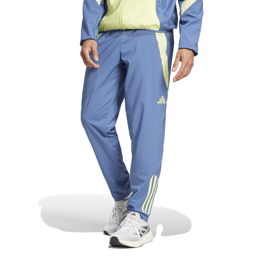 Pantalon survetement Ajax Amsterdam woven bleu jaune 2024 25 sur Foot