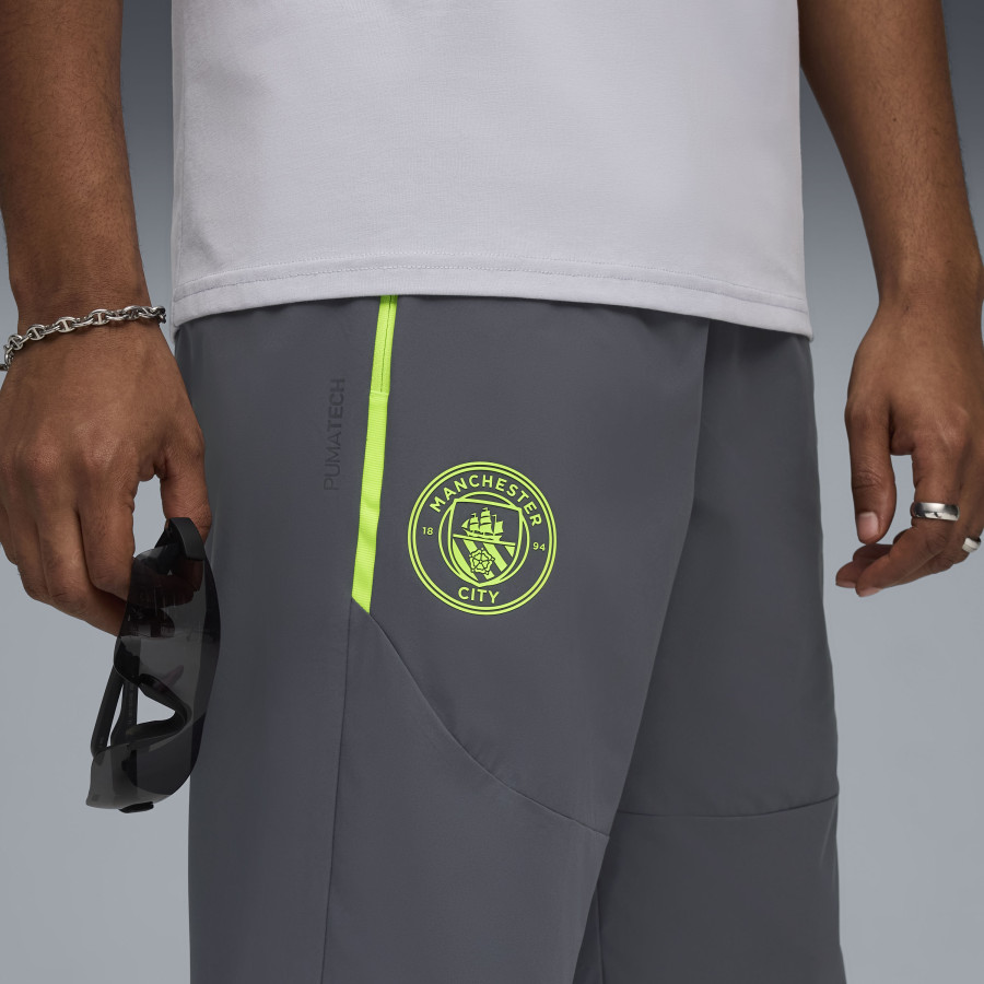 Pantalon survêtement Manchester City PUMATECH Woven gris jaune