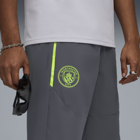 Pantalon survêtement Manchester City PUMATECH Woven gris jaune