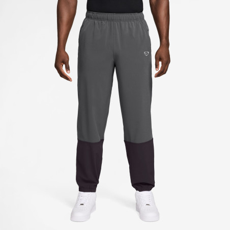 Pantalon survêtement woven Nike gris