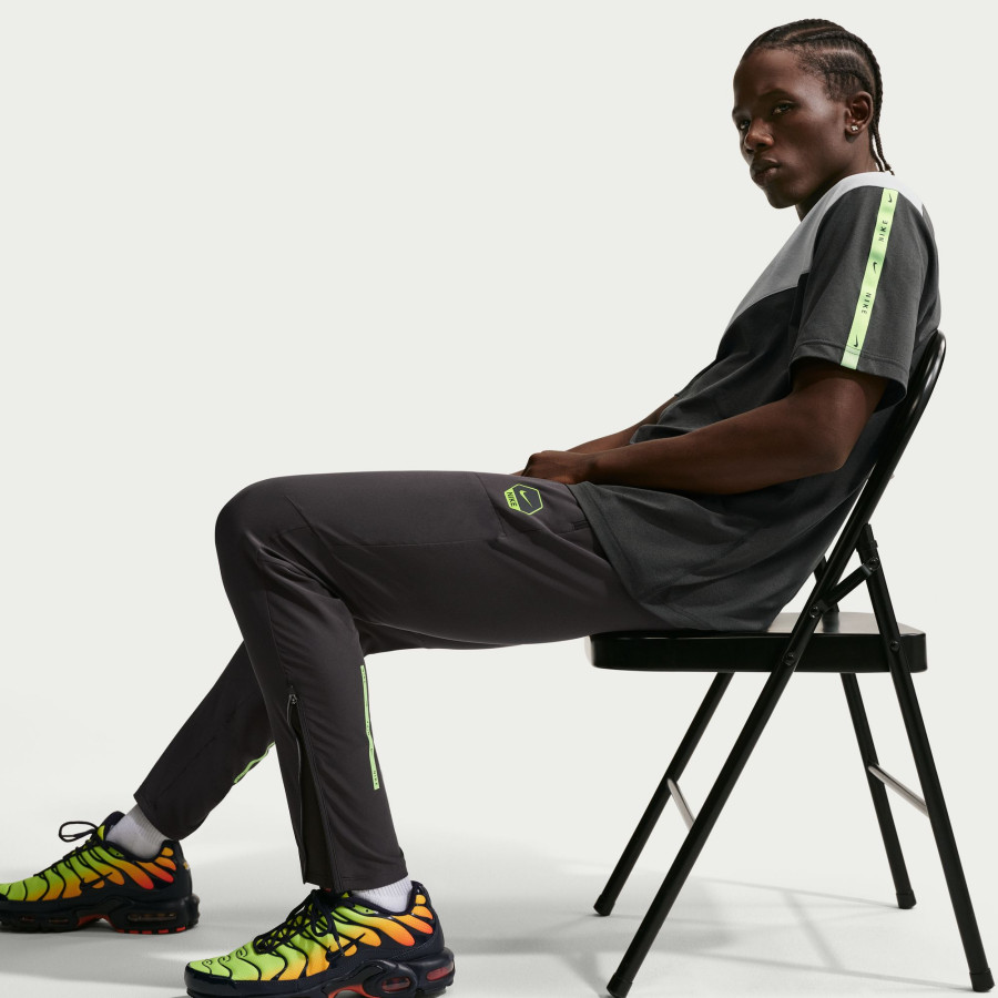 Pantalon survêtement Nike Run gris foncé