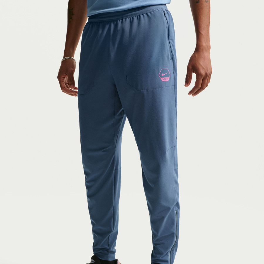 Pantalon survêtement Nike Run bleu rose