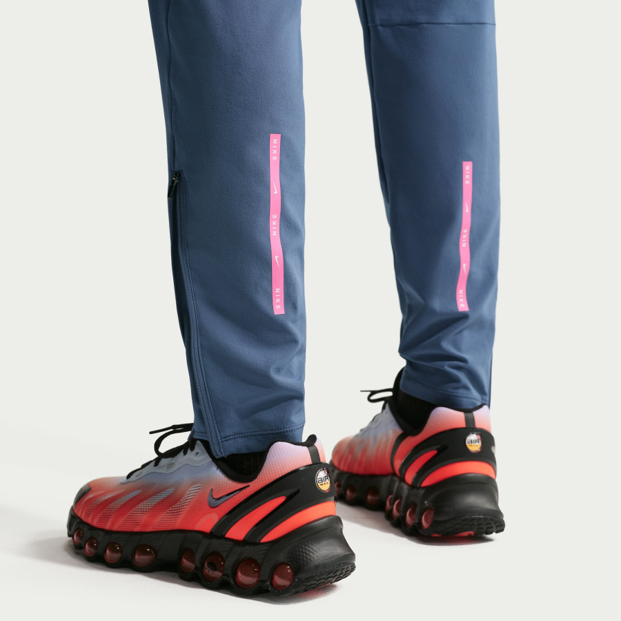 Pantalon survêtement Nike Run bleu rose