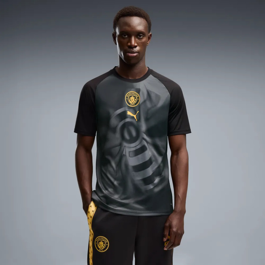 Maillot avant match Manchester City noir jaune
