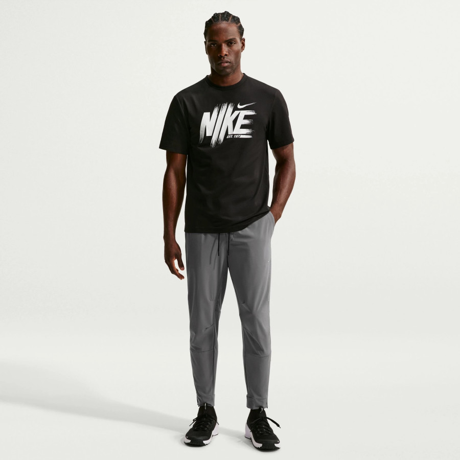 Pantalon survêtement Nike Unlimited gris