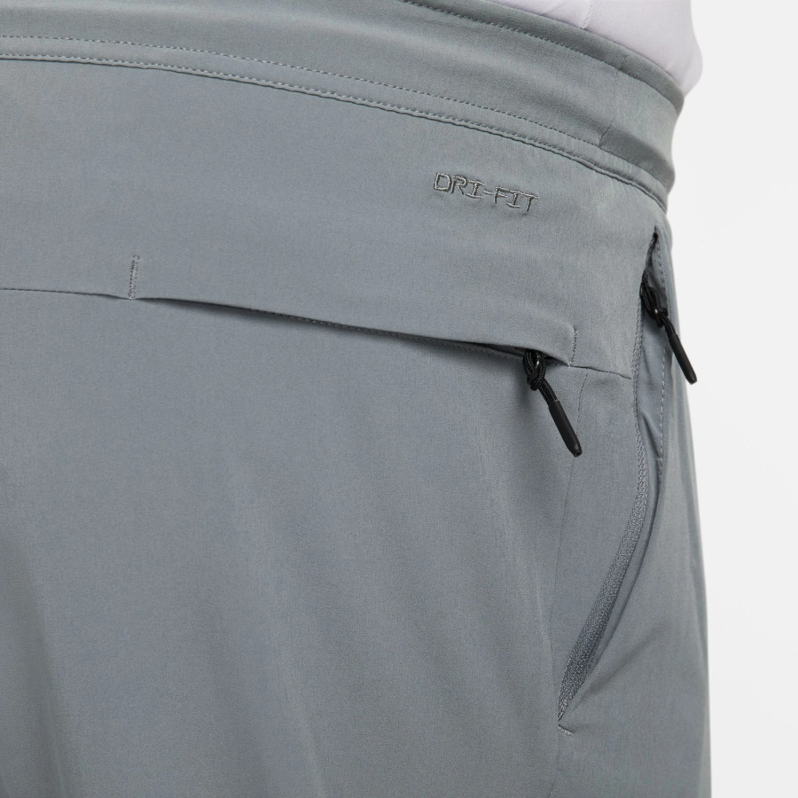 Pantalon survêtement Nike Unlimited gris
