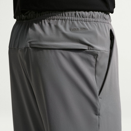 Pantalon survêtement Nike Unlimited gris