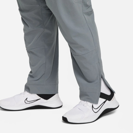 Pantalon survêtement Nike Unlimited gris