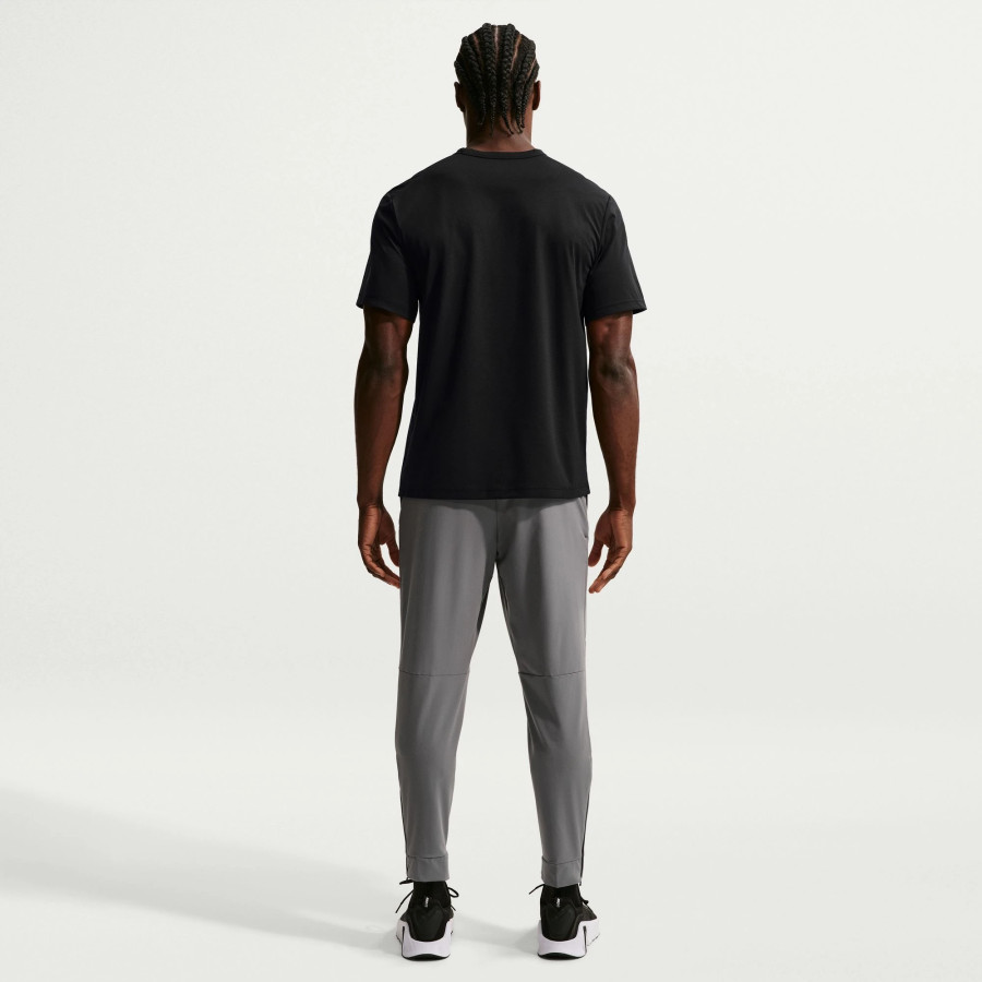 Pantalon survêtement Nike Unlimited gris