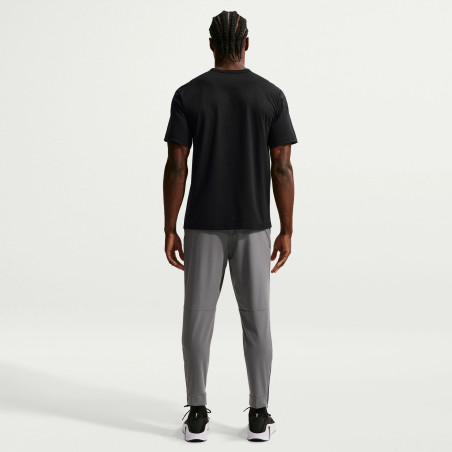 Pantalon survêtement Nike Unlimited gris