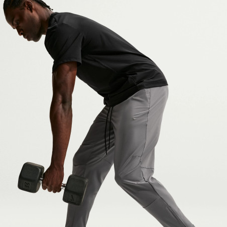 Pantalon survêtement Nike Unlimited gris