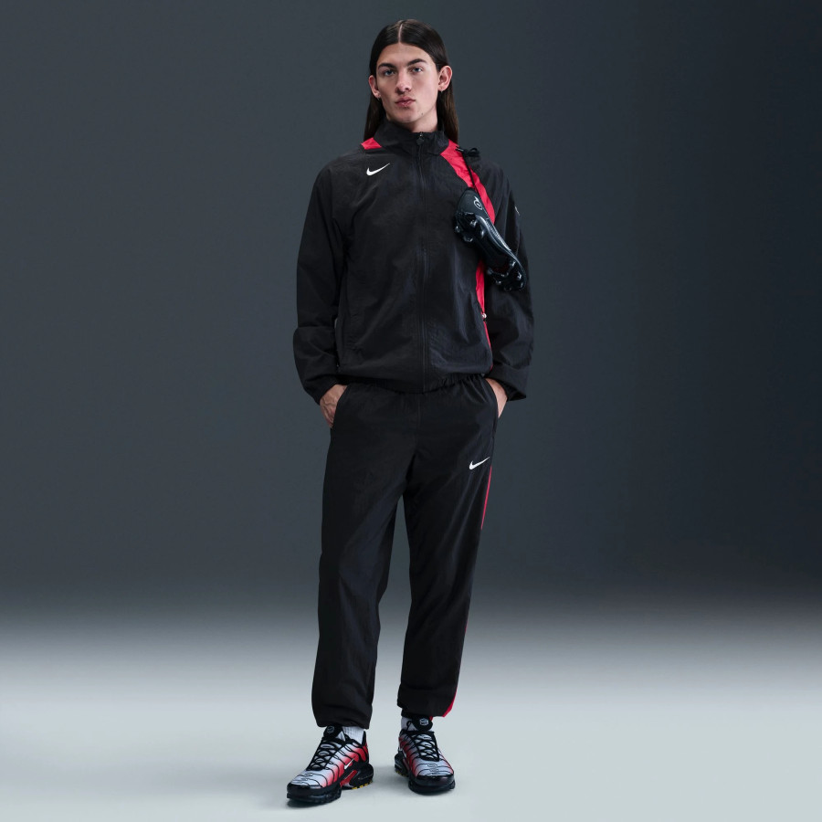 Pantalon survêtement Nike Woven Total 90 noir