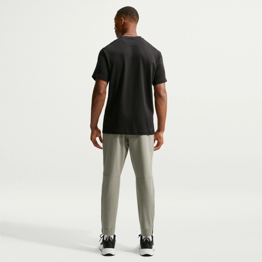 Pantalon survêtement Nike Unlimited vert
