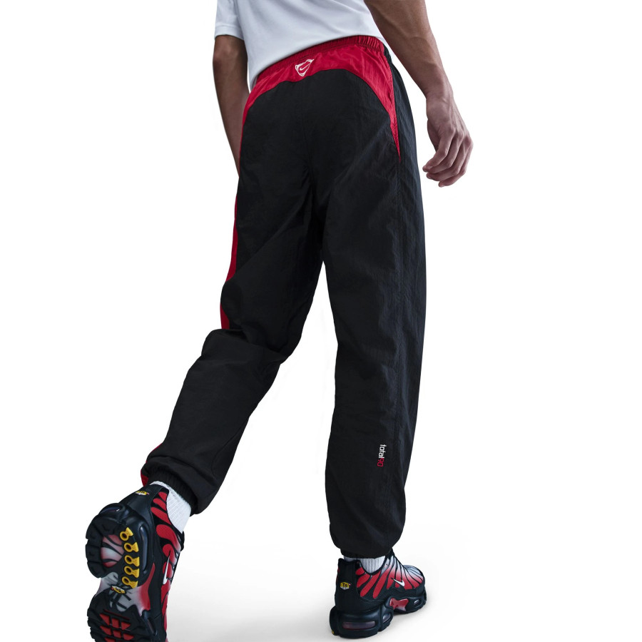 Pantalon survêtement Nike Woven Total 90 noir