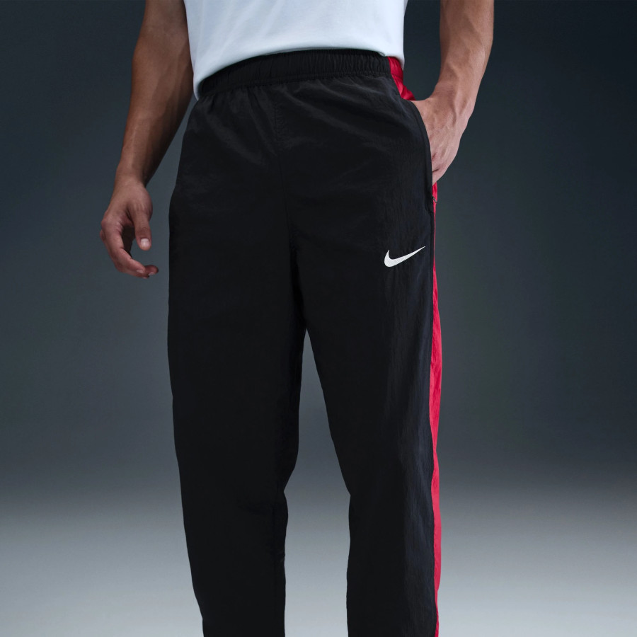 Pantalon survêtement Nike Woven Total 90 noir