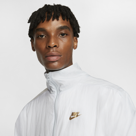 Veste survêtement Nike Air Woven blanc or