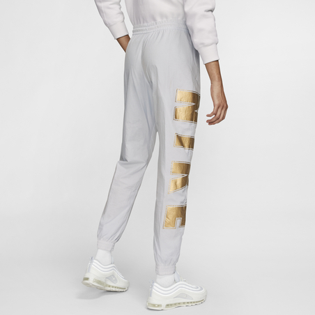 Pantalon survêtement Nike Air Woven blanc or