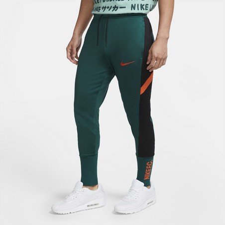 Pantalon survêtement Nike F.C. vert orange