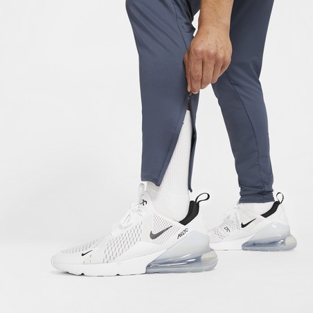 Pantalon survêtement Nike F.C. gris rose