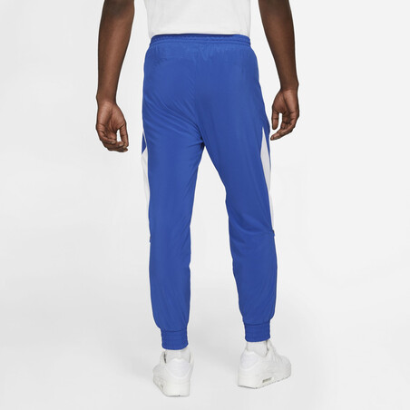 Pantalon survêtement Nike "Joga Bonito" microfibre bleu blanc