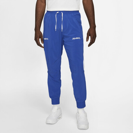 Pantalon survêtement Nike "Joga Bonito" microfibre bleu blanc