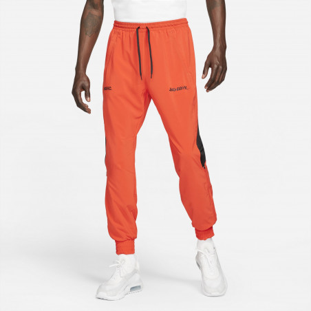 Pantalon survêtement Nike F.C. Joga Bonito orange 2021/22