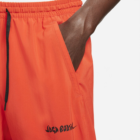 Pantalon survêtement Nike F.C. Joga Bonito orange 2021/22