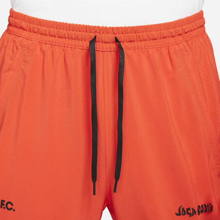 Pantalon survêtement Nike F.C. Joga Bonito orange 2021/22