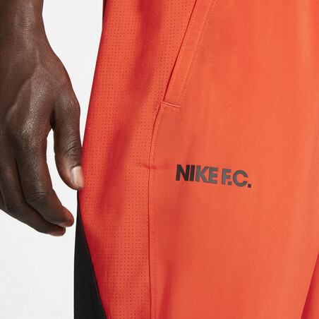 Pantalon survêtement Nike F.C. Joga Bonito orange 2021/22