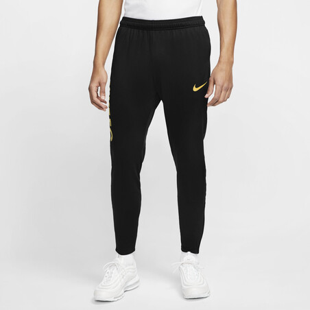 Pantalon survêtement Nike F.C. noir or