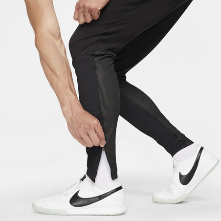 Pantalon survêtement Nike Therma-Fit noir orange